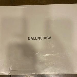 Women 7 black and green Balenciaga Worn only a few times. They glow in the dark